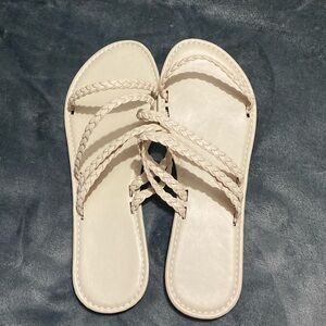 beige sandals size 10.5, unused